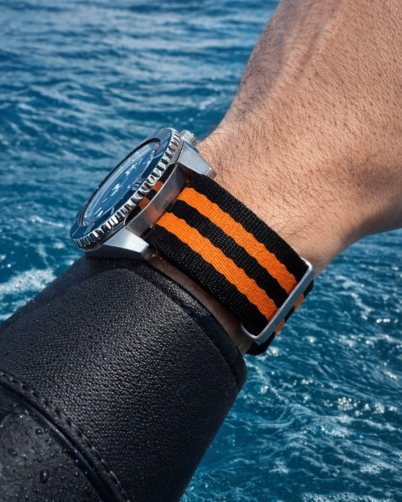 Bracelet montre en nylon noir et orange