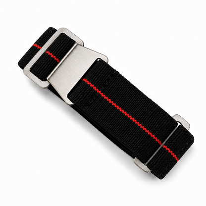 PLD Fallschirm-Uhrenarmband in Grau mit orangefarbenem Mittelstreifen aus elastischem Nylon und gebürsteter Edelstahlschließe für Militär- und Taucheruhren.