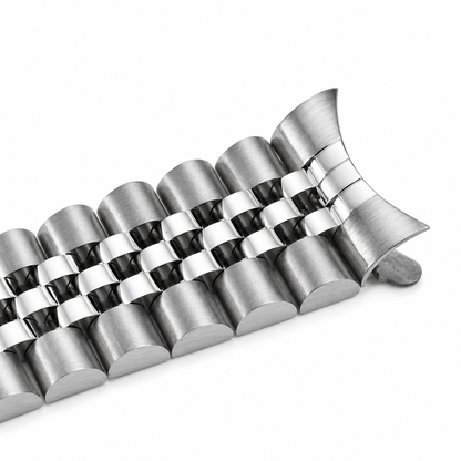 Close-up of a Jubilee stainless steel watch bracelet featuring three polished center link rows and two brushed outer link rows, compatible with Seiko 5 and SKX watches.